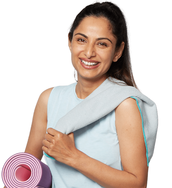 Woman holding a yoga mat